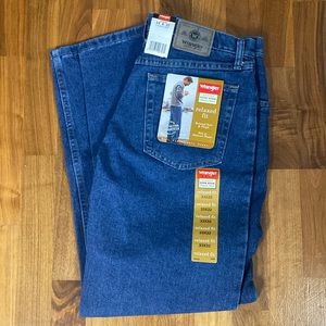 New, never worn, still with tags, wrangler relaxed, fit jeans